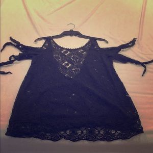Free people tank. Lace with tie sleeves and back.